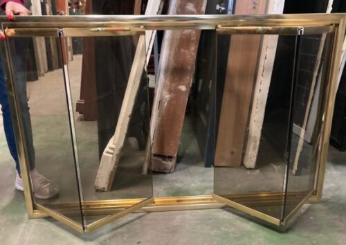 Brass and smoked glass fire screen with wooden handles and double bifold doors, 1140mm wide x 730mm high (F09) $225