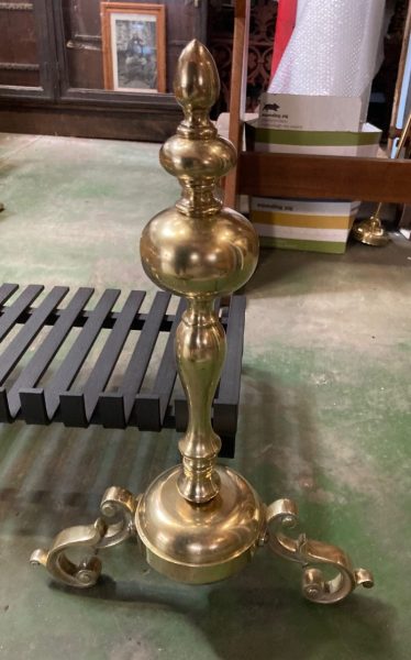 Detail of original heavy, solid brass fire dogs with cast iron fireplace log grate, each fire dog is 550 H x 370 W, grate is 610 W x 365 D (F194) $645