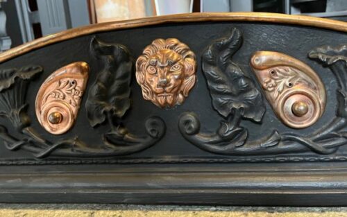 Lion detail of original cast iron fender with copper and lion detail, 1250 W x 330 D x 340 H (F324) $545