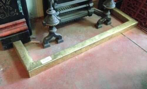 Simple vintage fireplace fender. Brass plate sheet with nail details over timber (detail), finish is looking a bit rustic with scuffs etc, d380 x w1370mm $120