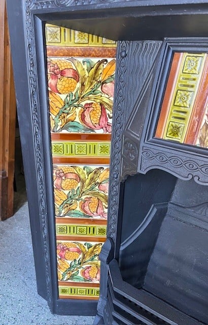 Original Victorian fireplace insert, fully restored cast iron. Late 1800s, unusual fine casting with original summer dress cover. Completed with stunning, rare hand painted feature tiles with pomegranates and foliage. Rich colours, and strong brushwork on the bold Aesthetic Period design. Possibly by Craven Dunnill / Godwin & Hewitt, UK. Selling as a complete set with the fireplace and original cast iron dress cover. H 965 x W 965mm - Image 5