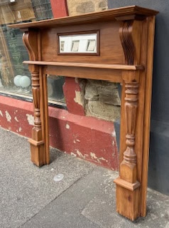 Edwardian polished timber mantel with pillared legs and bevelled mirror - Image 2